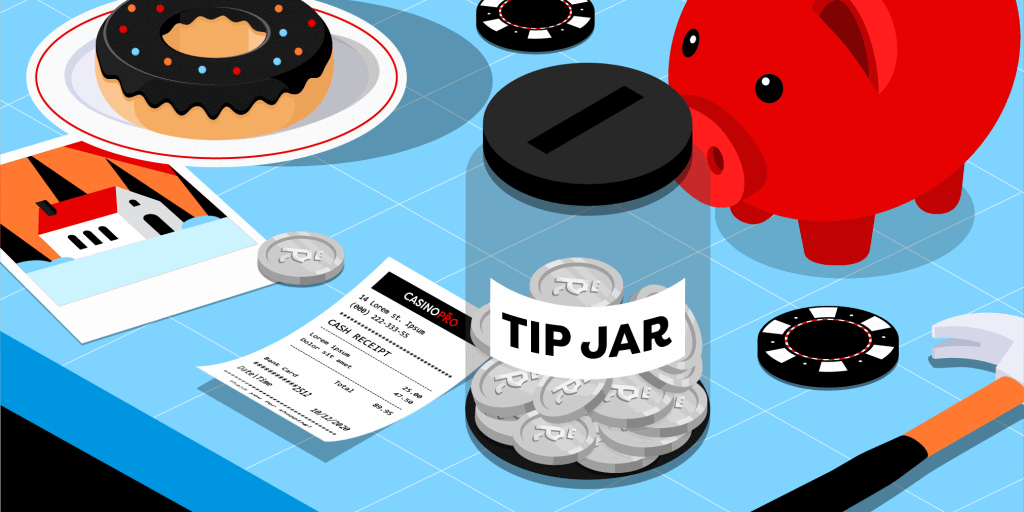 A tip jar filled with Casinopro coins on a blue table, with a piggy bank, casino chips, a receipt, a hammer and a donut